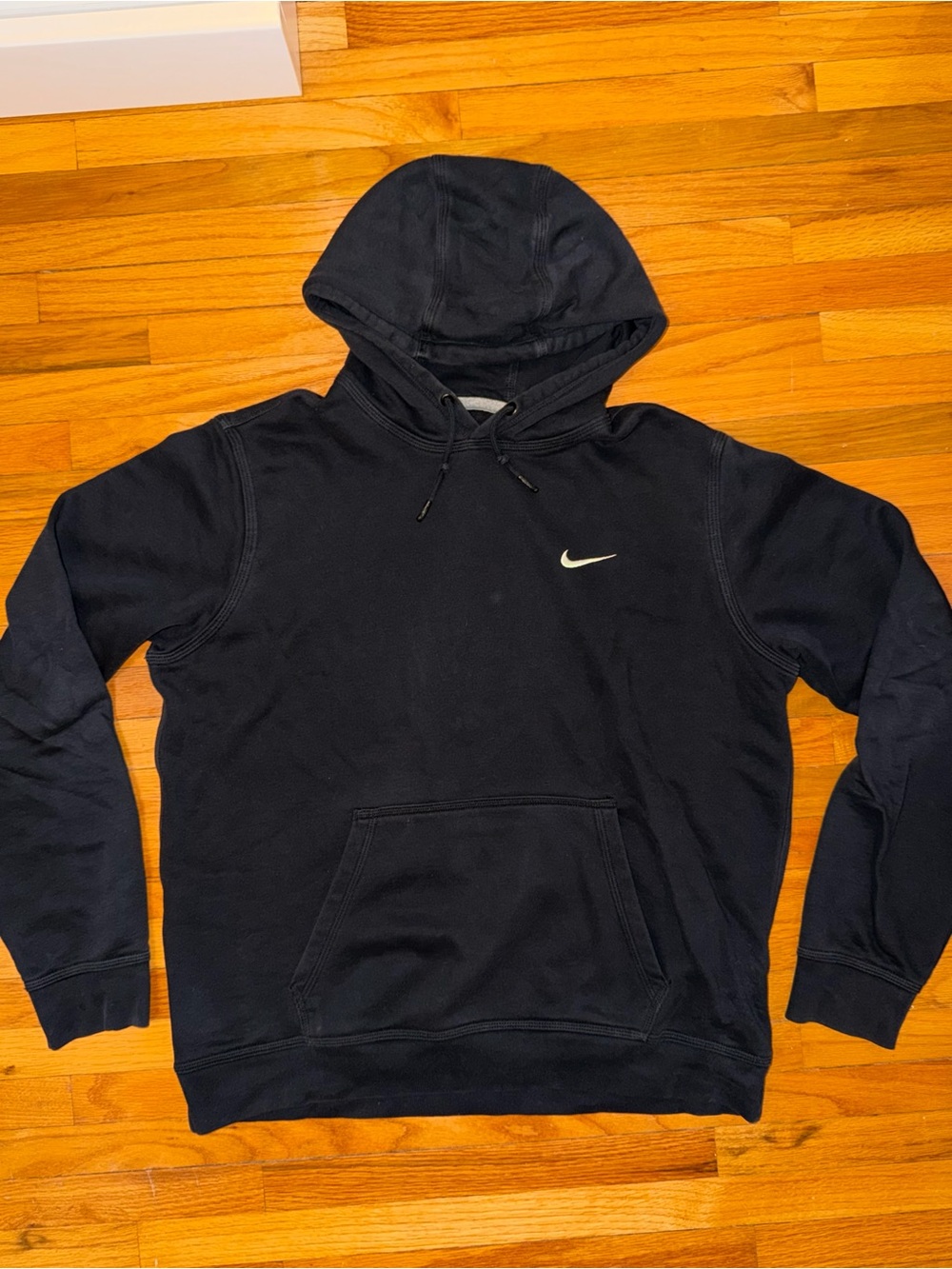 Nike Black Hoodie with White Swoosh Logo